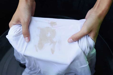 Why do my white clothes have stains after washing?